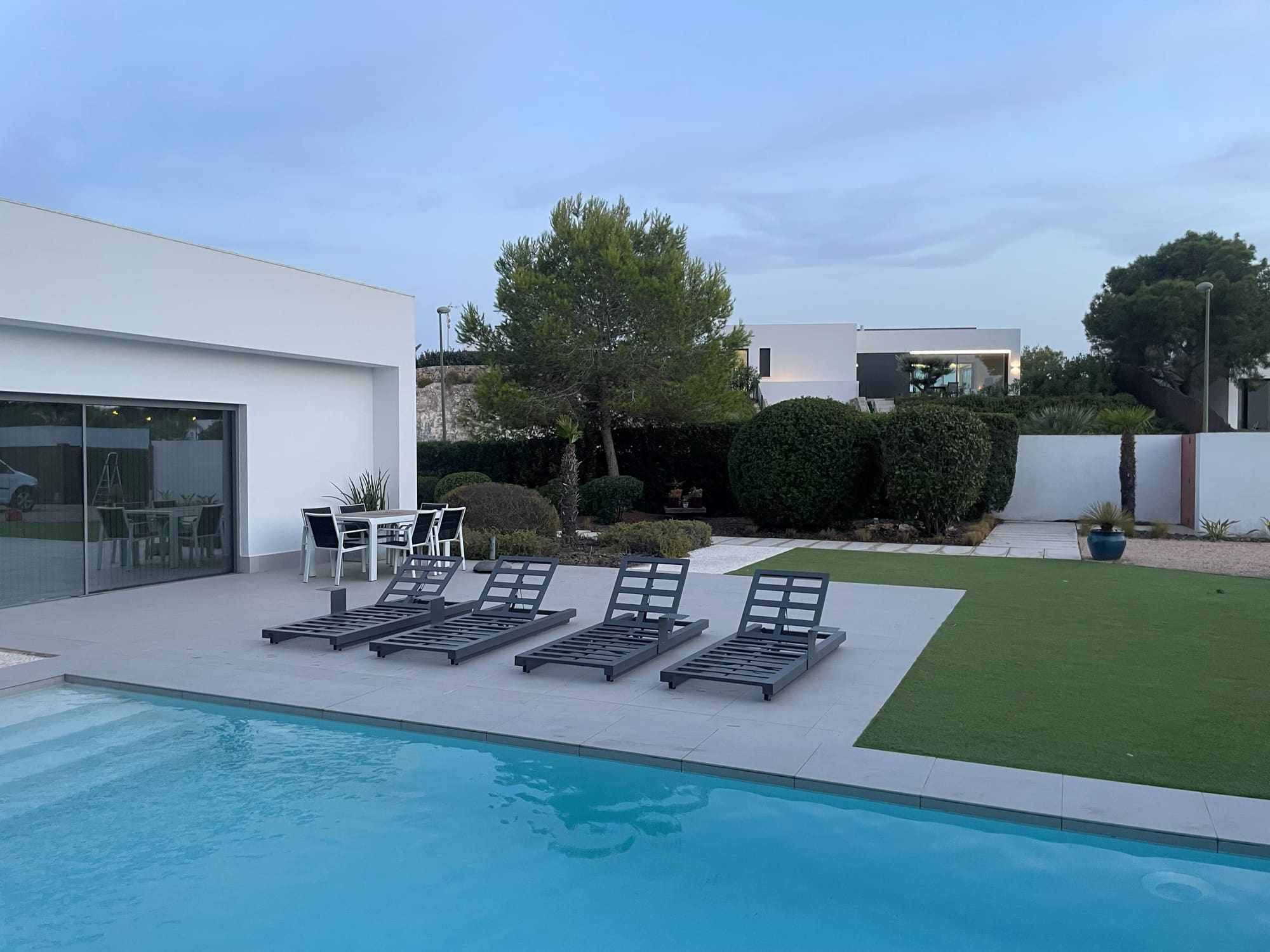 Villa pool terrace, loungers and garden on the Costa Blanca looked after by LeoProperty